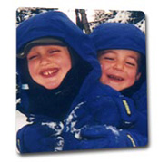 Two boys having fun in the snow